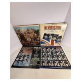 Four Beatle Albums in protective sleeve