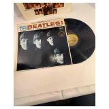 Two Beatle Albums in protective sleeve