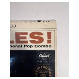 Two Beatle Albums in protective sleeve