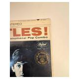 Two Beatle Albums in protective sleeve