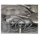 Bin full of Kohler Shower Wands and Parts