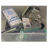 Mixed Bin of Open Electric Shavers and Water Picks
