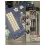 Mixed Bin of Open Electric Shavers and Water Picks