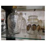 Collectible Items on 3 Glass Shelves - Twins, Ship in Bottle, Etc