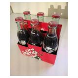 (6) Unopened 2001 Fighting Sioux Football Champions Coke Bottles