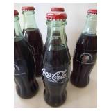 (6) Unopened 2001-02 Fighting Sioux Engelstad Arena Coke Bottles