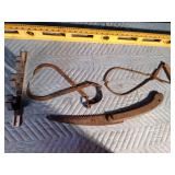 Vintage ice tongs, Vintage saw, Level and lawn tools holder