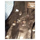 Leather Vest with buffalo nickle snaps and several pins