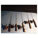 Bucket of ice fishing rods and reels