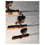 Bucket of ice fishing rods and reels