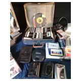 Cassettes, vintage cassette players, CDs, and cassette case