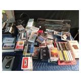 Cassettes, vintage cassette players, CDs, and cassette case