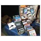 Cassettes, vintage cassette players, CDs, and cassette case