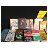 2 boxes of hard and soft covered books