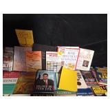 2 boxes of hard and soft covered books