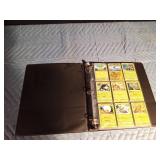 A binder of 96 Pokémon cards