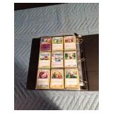 A binder of 96 Pokémon cards
