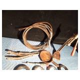 3 ton hooks, 2 cast iron pans, vintage bottle capper, sewer snake, tools, reflector