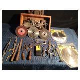 Wood box of tools, pulleys, saw blades, cut off wheels and more