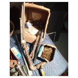 Tote of sheer pins, nails, screws, and more