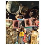 Tote of sheer pins, nails, screws, and more