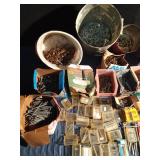 Tote of sheer pins, nails, screws, and more