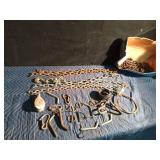 1 Large logging chain with hooks, 4 small chains, hooks, pulleys, several trailer pins and cable