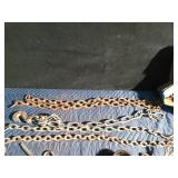 1 Large logging chain with hooks, 4 small chains, hooks, pulleys, several trailer pins and cable