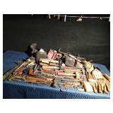 tote of tools with tool belt and knee pads