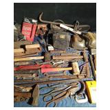 tote of tools with tool belt and knee pads