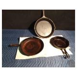 3 Cast iron frying pans