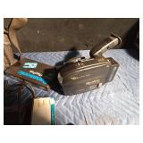 Quaser camcorder in case with 2 extra batteries and 7 tapes