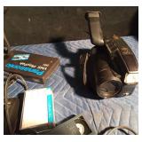 Quaser camcorder in case with 2 extra batteries and 7 tapes