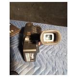 Quaser camcorder in case with 2 extra batteries and 7 tapes