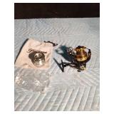 DU 3000 Fishing reel and a Pflueger fishing reel new spool