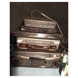 Box of electronics - Cassette, DVD, CD, VHS players, radio, and more