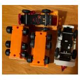 Four Toy Trucks