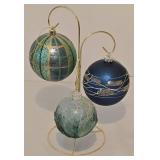 Trio of Hand Blown Glass Ornaments on a Single Display Stand