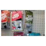 Large assortment of vacuum cleaner bags.