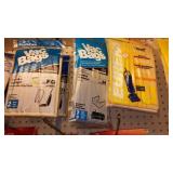 Large assortment of vacuum cleaner bags.