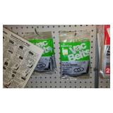 Large assortment of vacuum cleaner bags.