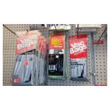 Large assortment of vacuum cleaner bags.