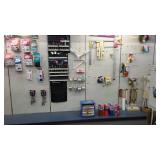 Lighted Peg Board, hooks and Shelving.