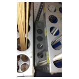 Assorted threaded rods and metal organizer.