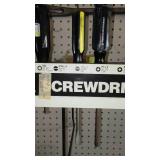 Assorted Screwdrivers with peg board organizer and Pry Bar.