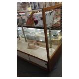 Double Sided Display Shelving with Storage.