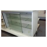 Double Sided Peg Board and Glass Display.