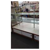 Double Sided Display Shelving with Storage.