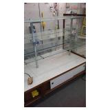 Double Sided Display Shelving with Storage.