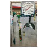 Outdoor Garden Hose hanger, spray wand, rain gauge.
